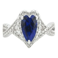 Arista létrehozta a Blue Sapphire és a White Sapphire Fashion Heart eljegyzési gyűrűt ezüst overlay -ben